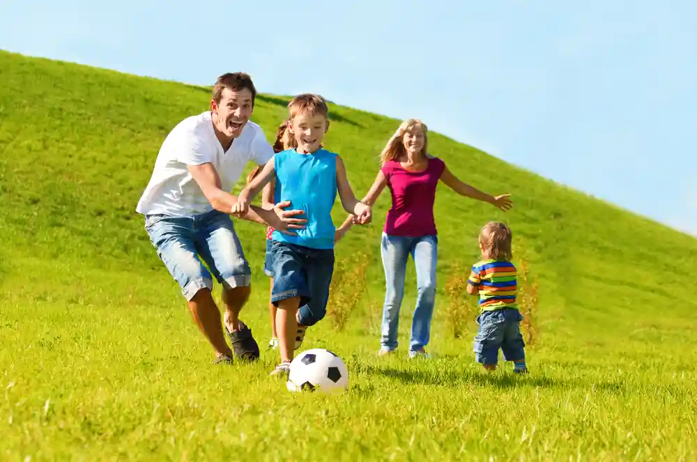 Personal Family Protection Investments - family playing soccer
